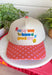 Start every day with a smile in this cheerful trucker hat. Featuring "On My Way To Have A Good Day" embroidered in colorful thread, it's the perfect reminder to embrace every adventure with a positive attitude. The coral bill with playful pink polka dots and matching top button add a fun pop of color, making this hat a standout accessory for everything from coffee runs to weekend road trips. Finished with an adjustable fit, it's the perfect blend of comfort, personality, and everyday style.