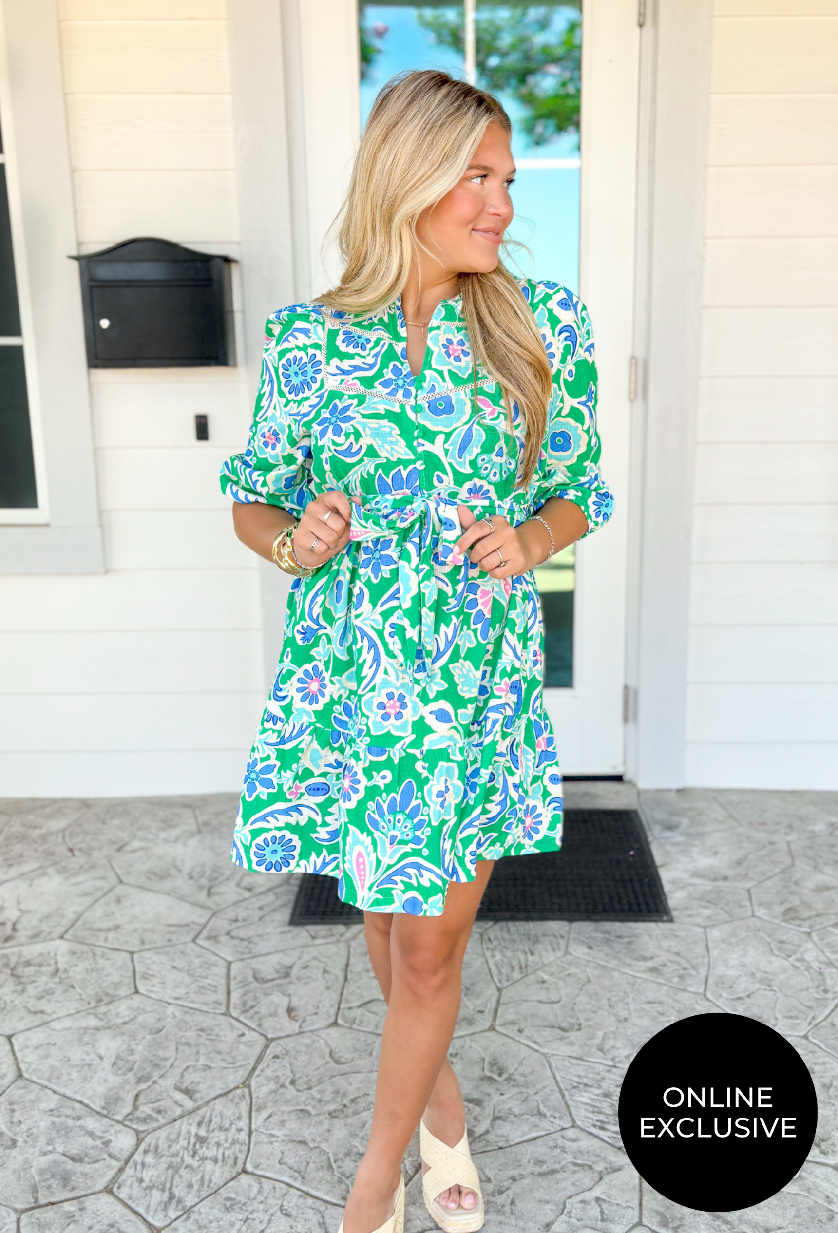 Breath Of Fresh Air Dress, kelly green quarter sleeve button down floral print dress with white lace details and cobalt blue and pink paisley floral design, tie belt around the waist