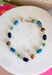 Add the perfect finishing touch to your outfit with this beautifully detailed beaded necklace! Featuring turquoise, green, brown, and navy beads separated by shimmering gold accents, this timeless piece brings just the right amount of color and elegance to your jewelry collection. The 18K gold-dipped finish gives it a polished look that's easy to wear from everyday outings to special occasions, making it a versatile accessory you'll reach for season after season.