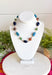 Add the perfect finishing touch to your outfit with this beautifully detailed beaded necklace! Featuring turquoise, green, brown, and navy beads separated by shimmering gold accents, this timeless piece brings just the right amount of color and elegance to your jewelry collection. The 18K gold-dipped finish gives it a polished look that's easy to wear from everyday outings to special occasions, making it a versatile accessory you'll reach for season after season.