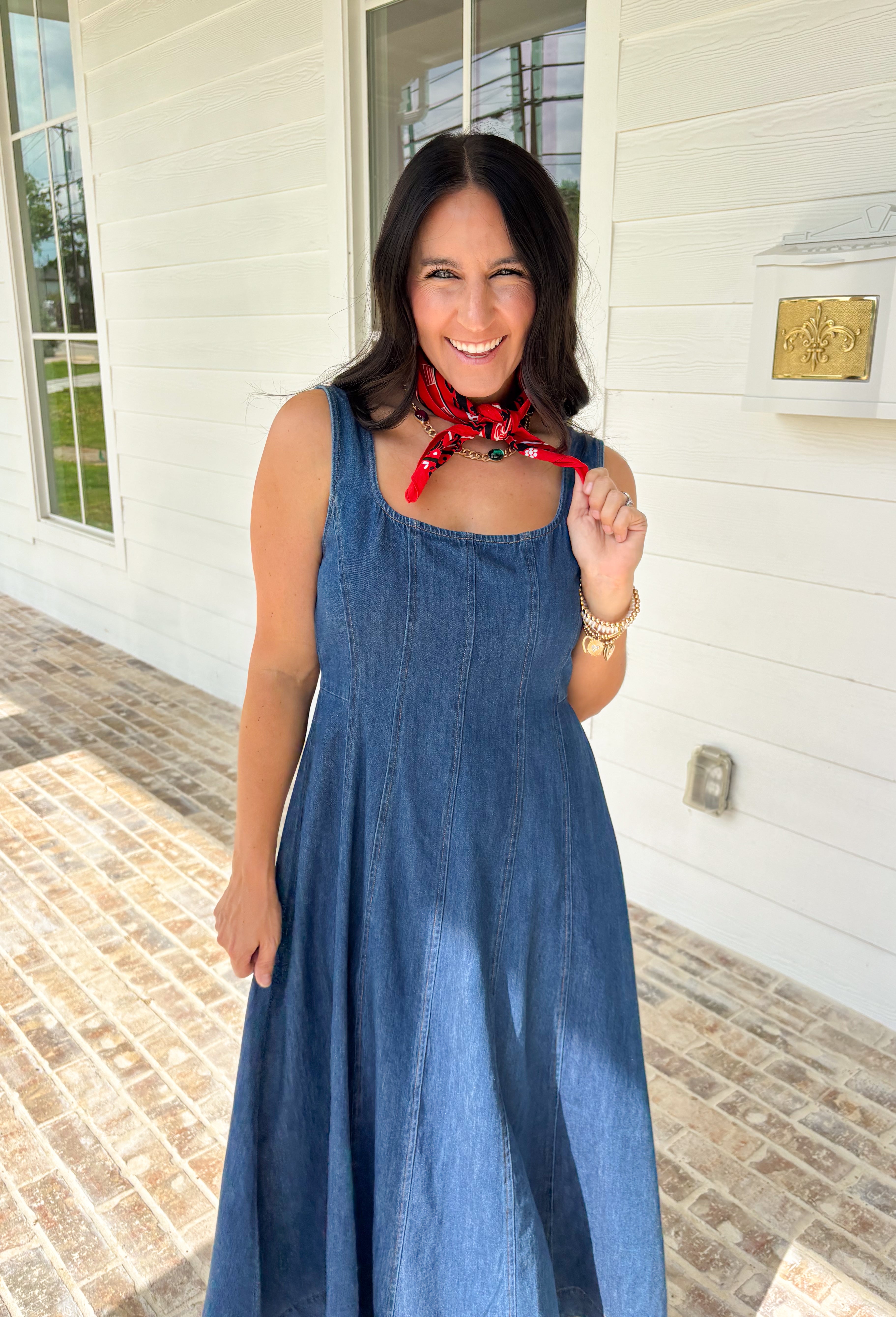 This dark wash sleeveless midi dress is the kind of effortless staple you’ll reach for all summer long! The rich denim wash gives it a slightly elevated feel, while the pleating along the front adds a soft, flattering detail. The smocked back keeps the fit comfortable and easy, making it perfect for all-day wear. Lightweight and breathable in 100% cotton, it’s ideal for everything from casual days to dinner plans. 