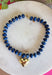 Add a meaningful finishing touch to your favorite outfits with this beautifully crafted beaded necklace. Featuring rich navy beads accented with delicate gold beads throughout, this timeless piece is finished with a gold heart charm for the perfect blend of classic style and everyday elegance. Whether worn on its own or layered with your favorite chains, this versatile necklace adds just the right amount of charm to everything from cozy sweaters to dresses and blouses all season long.