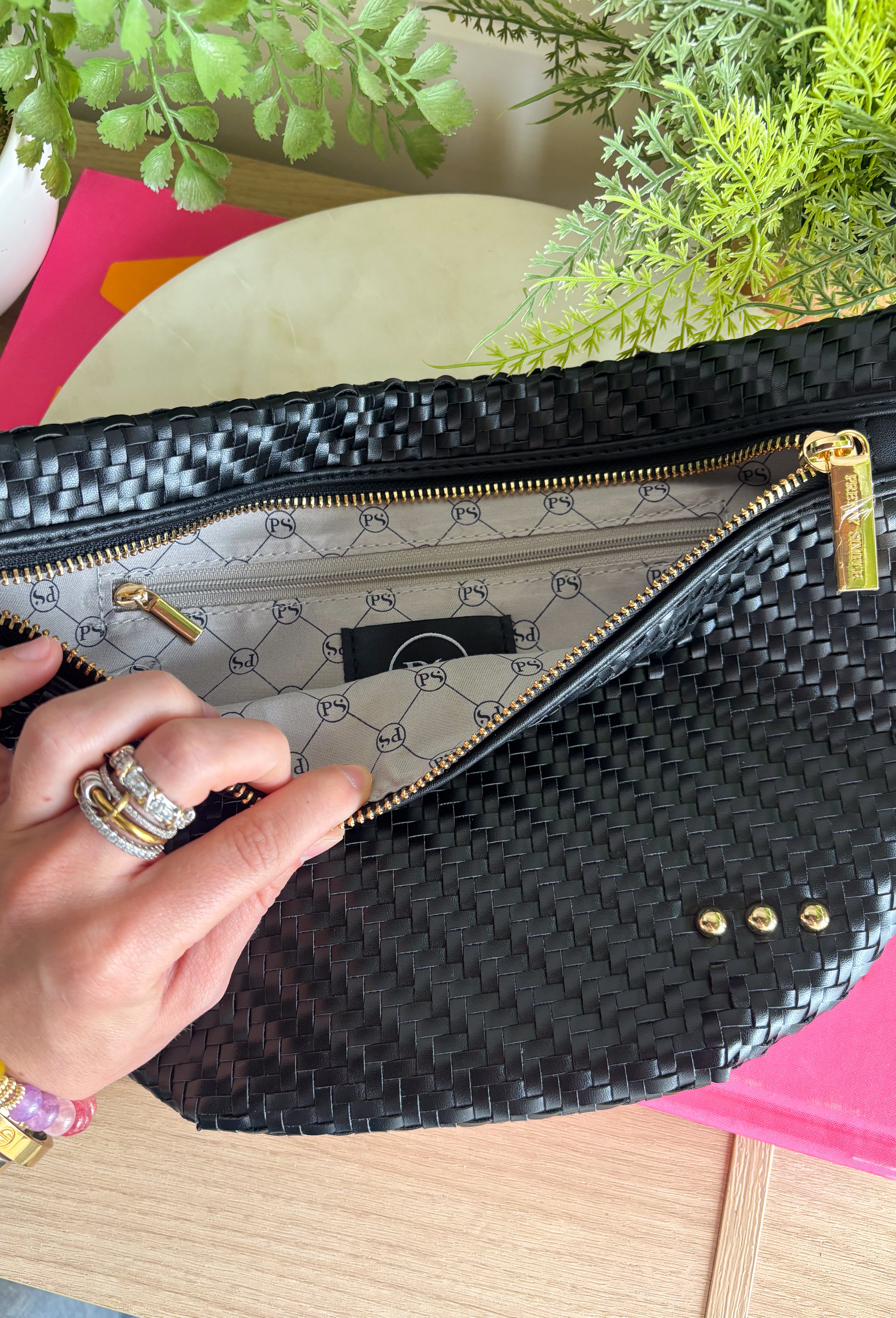 Meet your favorite Westlyn Woven Bum Bag in a new style! Gorgeous diagonal woven design makes this perfect for any occasion! Beautiful hardware with a zipper closure with "Pretty Simple" interior, and a zippered slash pocket on the inside. This crossbody bag is the perfect accessory to elevate any outfit!