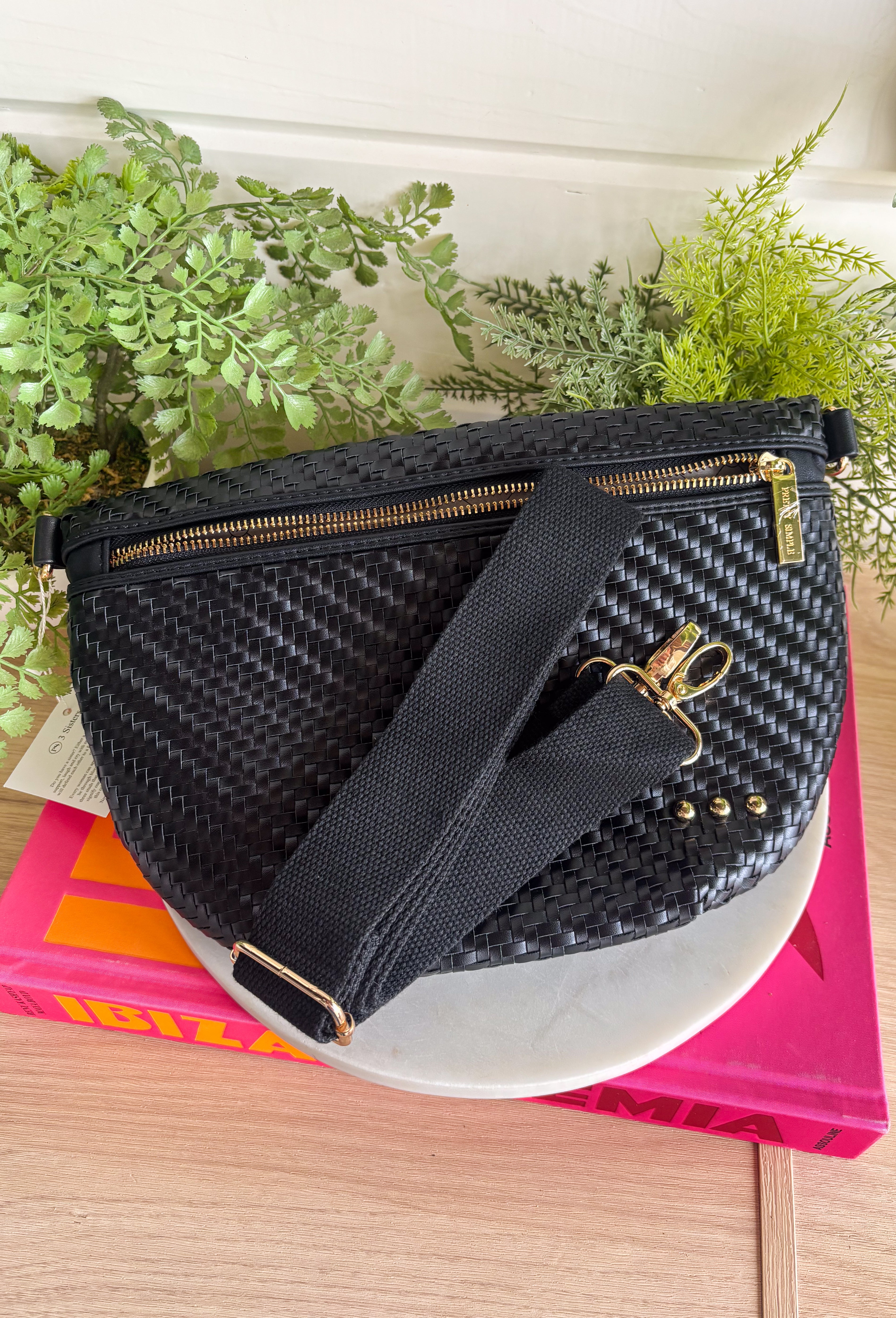 Meet your favorite Westlyn Woven Bum Bag in a new style! Gorgeous diagonal woven design makes this perfect for any occasion! Beautiful hardware with a zipper closure with "Pretty Simple" interior, and a zippered slash pocket on the inside. This crossbody bag is the perfect accessory to elevate any outfit!