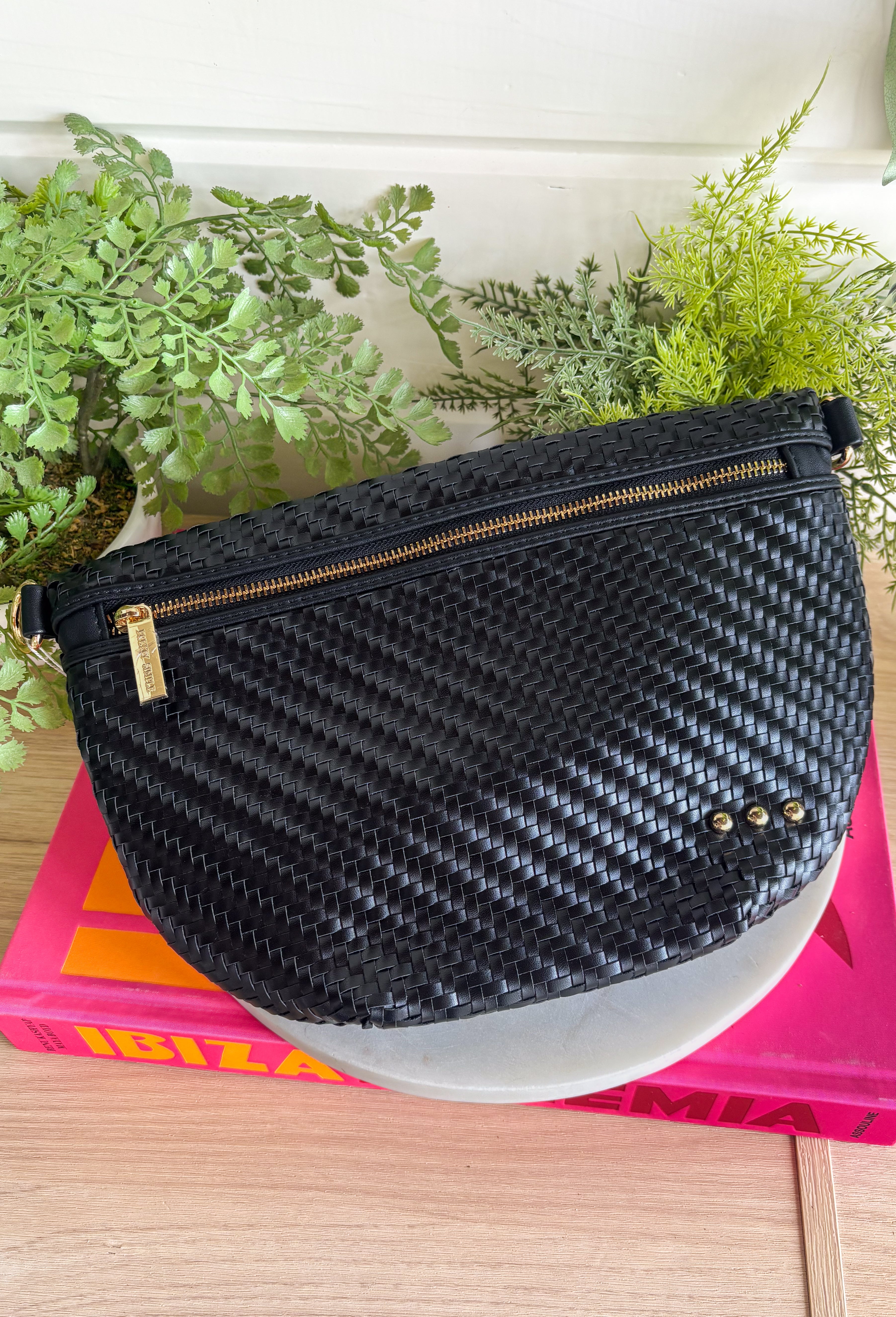 Meet your favorite Westlyn Woven Bum Bag in a new style! Gorgeous diagonal woven design makes this perfect for any occasion! Beautiful hardware with a zipper closure with "Pretty Simple" interior, and a zippered slash pocket on the inside. This crossbody bag is the perfect accessory to elevate any outfit!