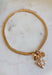 This chunky gold textured chain necklace is the statement piece your spring outfits have been waiting for! With its bold chain and mixed charm design featuring pearl detailing, it brings the perfect mix of trendy and timeless. The textured finish adds dimension, while the pearls soften the look with a classic touch. Perfect for brunch, events, or everyday wear when you want to feel a little extra. Go ahead—this one deserves a spot in your jewelry lineup!
