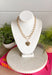 An effortless layered look with a sweet touch of shine! This gold layered necklace features delicate strands with small gold beads throughout, finished with a textured gold heart pendant that adds just the right amount of charm. The layered design makes styling easy—giving you that perfectly stacked look in one simple piece. Whether worn with a casual outfit or dressed up for a special moment, this necklace adds a soft, feminine glow to any look.