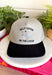 This trucker hat is serving up plenty of personality! Featuring "Silly Goose On The Loose" embroidered across the front, it's finished with the cutest white goose rocking pearls, sunglasses, and a martini for the ultimate playful touch. The neutral crown and black bill make it easy to style with all your favorite casual looks, while the detailed embroidery gives it a fun, elevated feel. You'll constantly find yourself reaching for this hat!
