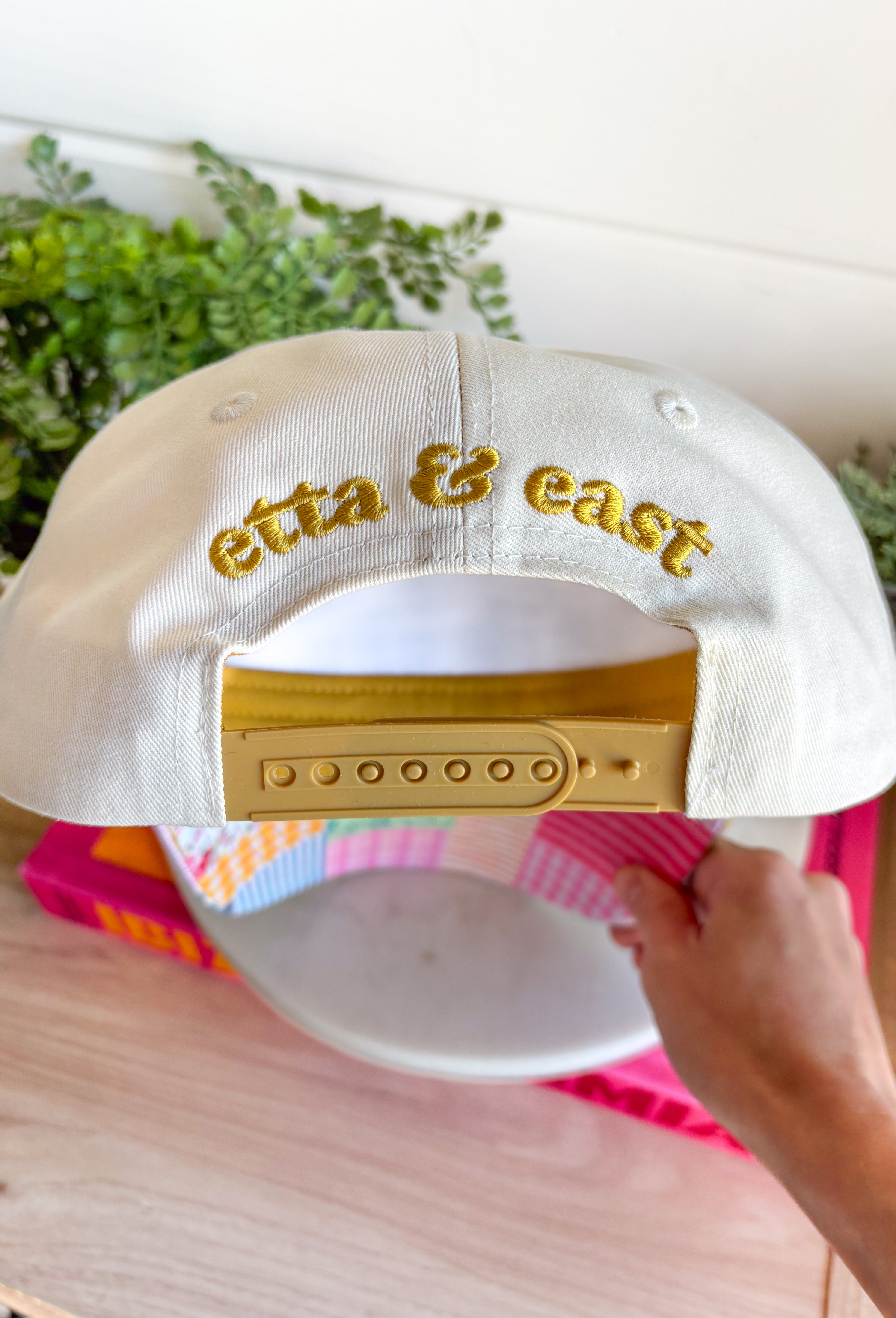 This “Slow Weekend Club” trucker hat is all about those laid-back summer moments! With olive embroidery on a neutral base, it keeps things easy and versatile, while the colorful patchwork bill adds the most fun, unexpected pop. Even better—each hat features a unique patchwork design, so no two are exactly alike. It’s playful, relaxed, and made for coffee runs, errands, or those slower days you actually get to enjoy. Throw it on and lean into those easy weekend vibes—add it to your cart now!