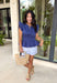 This navy top is such a timeless staple for your summer wardrobe! The rich color feels classic and easy to style, while the elastic waist creates a flattering, effortless shape that’s comfortable for all-day wear. The ruffle sleeves add a soft, feminine touch, and the v-neckline keeps it light and breezy for warm days. Made from breathable cotton, it’s perfect for everything from casual outings to lunch with friends.