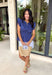 This navy top is such a timeless staple for your summer wardrobe! The rich color feels classic and easy to style, while the elastic waist creates a flattering, effortless shape that’s comfortable for all-day wear. The ruffle sleeves add a soft, feminine touch, and the v-neckline keeps it light and breezy for warm days. Made from breathable cotton, it’s perfect for everything from casual outings to lunch with friends.