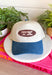 Simple, timeless, and full of Texas pride! This neutral trucker hat is the perfect everyday accessory for anyone who loves the Lone Star State. Featuring a brown embroidered patch outlined in tan with a bold "TX" design, it pairs effortlessly with everything from graphic tees to cozy sweatshirts. The denim bill adds a laid-back touch, while the adjustable back ensures a comfortable fit for all-day wear.