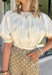 This cream cotton top is the definition of effortless fall style! Designed with a versatile elastic neckline, you can wear it on or off the shoulders depending on your mood and the occasion. The relaxed silhouette is finished with an elastic hem and gathered cuffs, creating a flattering shape that's equal parts comfortable and chic. Crafted from breathable cotton, it's perfect for those crisp autumn afternoons and layers beautifully with your favorite denim jacket or cardigan. 