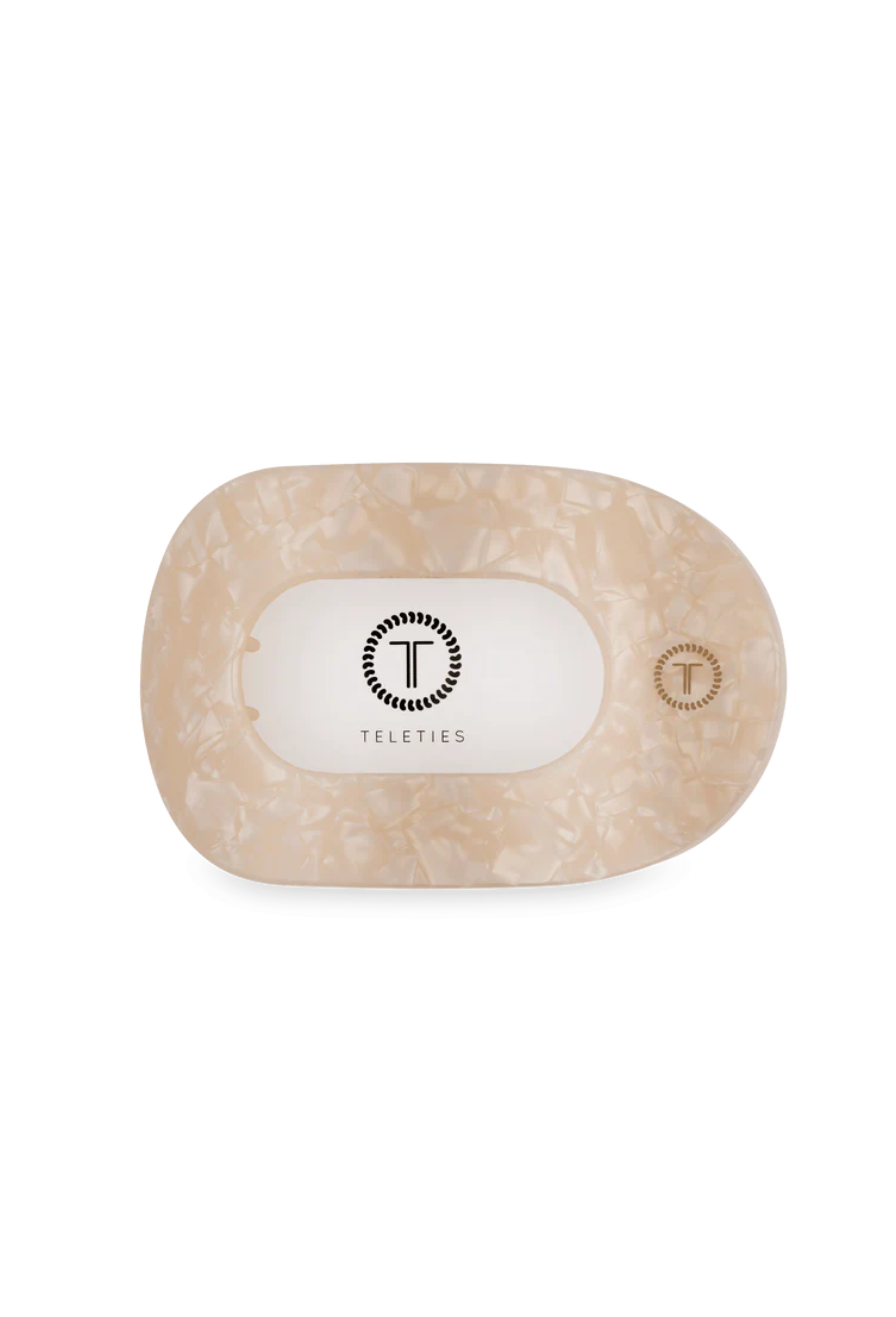 Lay flat and relax with the new&nbsp;TELETIES Soft Surf Medium Flat Round&nbsp;Hair Clip&nbsp;in Tan. This hair clip is designed to allow you to lay back flat, do yoga, or sit comfortably in a seat with a headrest, and it is made with the same material that is nearly unbreakable.