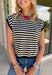 Timeless stripes get a fun seasonal update in this cozy short sleeve sweater. Featuring classic black and white stripes with a bold red contrast neckline, this knit is the perfect blend of classic and playful. The soft, cozy fabric makes it ideal for crisp fall mornings and cool evenings, while the short sleeves make layering effortless under jackets, and blazers. 