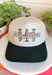 Whether you're headed to the lake, spending the day outdoors, or just love a playful graphic accessory, this trucker hat from The Happiest is the perfect finishing touch. Featuring a neutral crown with a hunter green bill, this hat is embroidered with "Today's Catch" and a colorful fish design in shades of green, blue, and pink for a fun, laid-back look. The adjustable fit makes it comfortable for all-day wear, making it an easy grab-and-go accessory for every adventure.