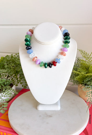 Brighten every outfit with this beautifully handcrafted beaded necklace! Designed with stunning marble beads in blush, lavender, mint, sky blue, emerald, and berry, this colorful accessory brings a playful yet elevated touch to your everyday style. Each handcrafted bead gives the necklace its own unique character, making it a one-of-a-kind piece you'll love wearing season after season. Whether layered with your favorite chain or worn on its own, it's the perfect finishing touch for any look.