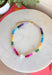 This colorful gemstone beaded necklace is pure happiness in accessory form! Featuring a mix of purple, blue, orange, yellow, green, and pink with a pearl accent, it adds the perfect playful pop to all your summer outfits. It’s bright, fun, and instantly makes even the simplest look feel styled. The shorter length sits perfectly at the neckline, making it great for layering or wearing solo as a statement.