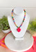 Bright, playful, and full of personality! This colorful beaded necklace is the perfect piece to add a little happiness to your look. Featuring a mix of vibrant beads and a bold hot pink pendant charm, it brings a fun pop of color that instantly livens up any outfit.&nbsp;The adjustable chain makes it easy to style at different lengths, whether worn on its own or layered with other favorites. Cheerful and eye-catching, this necklace is a simple way to add a little joy to your everyday style.