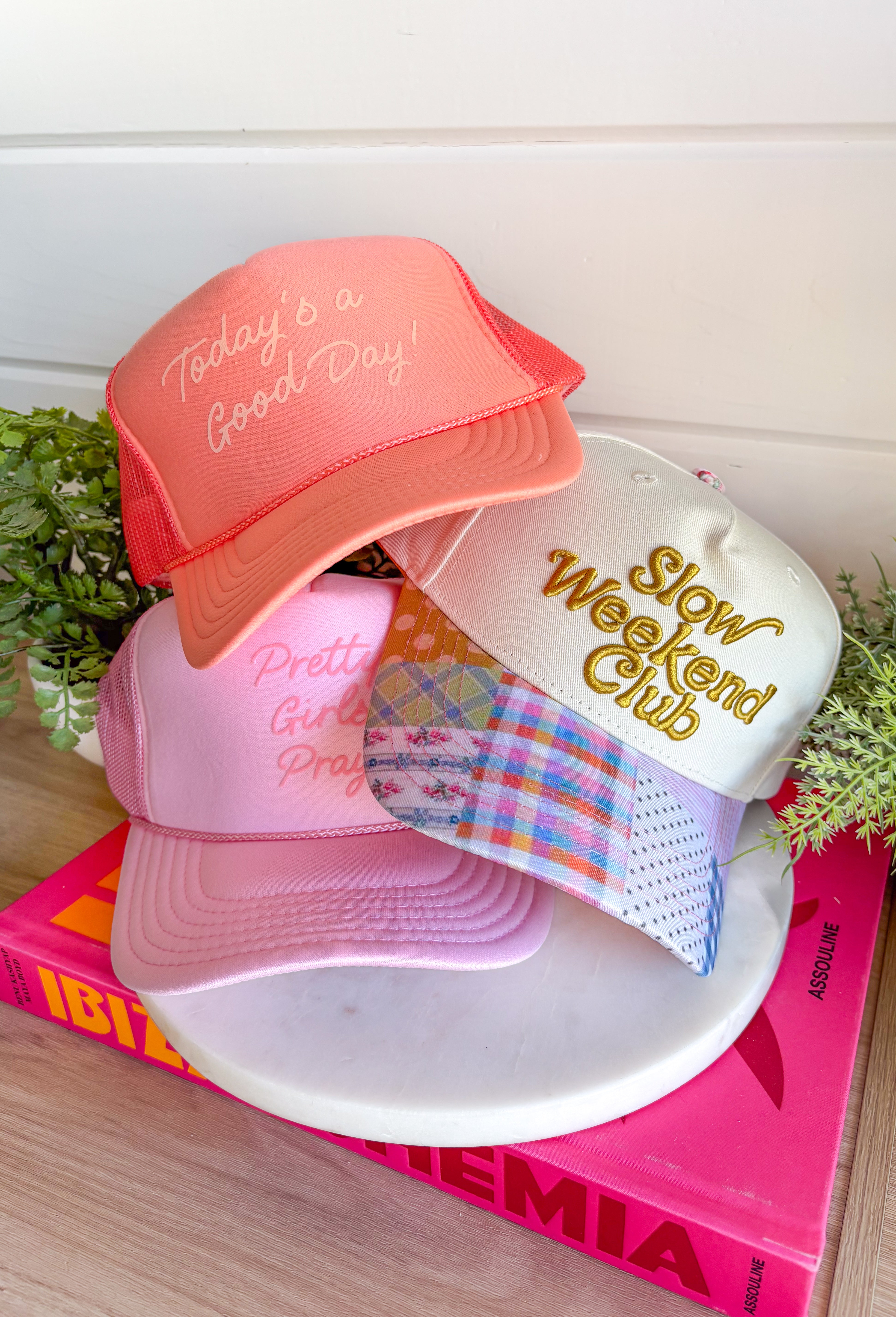 This “Slow Weekend Club” trucker hat is all about those laid-back summer moments! With olive embroidery on a neutral base, it keeps things easy and versatile, while the colorful patchwork bill adds the most fun, unexpected pop. Even better—each hat features a unique patchwork design, so no two are exactly alike. It’s playful, relaxed, and made for coffee runs, errands, or those slower days you actually get to enjoy. Throw it on and lean into those easy weekend vibes—add it to your cart now!