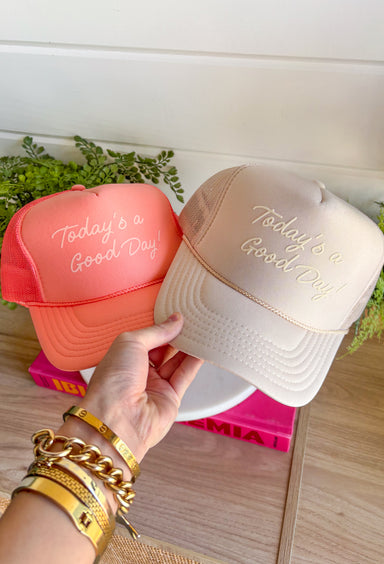 This tan trucker hat is your new go-to reminder to keep things light and positive! With its monochromatic “Today’s A Good Day” design, it’s simple, uplifting, and easy to style with all your summer outfits. The breathable mesh back keeps it cool for those hot, on-the-go days, while the adjustable fit makes it comfortable for all-day wear. Whether you're heading out for errands, a walk, or just enjoying some sunshine, this hat adds the perfect feel-good touch. Go ahead—throw it on and make it a good day!