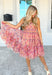 A Little Bit Flirty Dress, tule floral strapless dress with smocked chest in the colors red, pink, orange, yellow, blue, brown, and cream, can also be worn as a  midi skirt