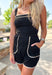 Cruel Summer Romper, black sleeveless romper with tan stitched edges on the chest, pockets, and bottom hem