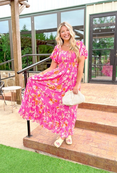 Love At First Sight Floral Maxi Dress, bright pink puff sleeve floral maxi dress with cinching at the waist and tie detail at the center of the chest 
