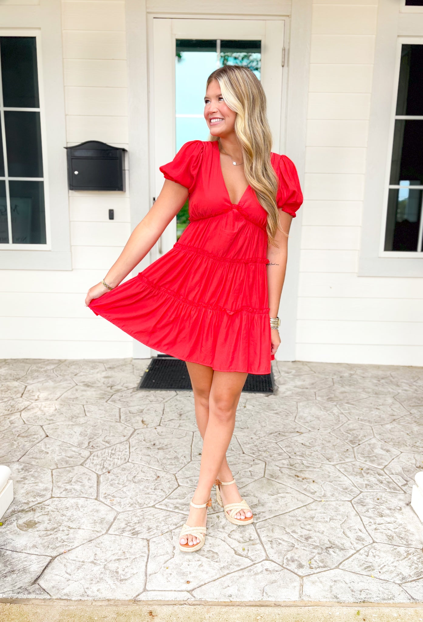 Meet Me In The Maldives Dress, short puff sleeve dress with deep v-neck and tiering, ruffling on each of the tiers as well as the hem of the puff sleeve 