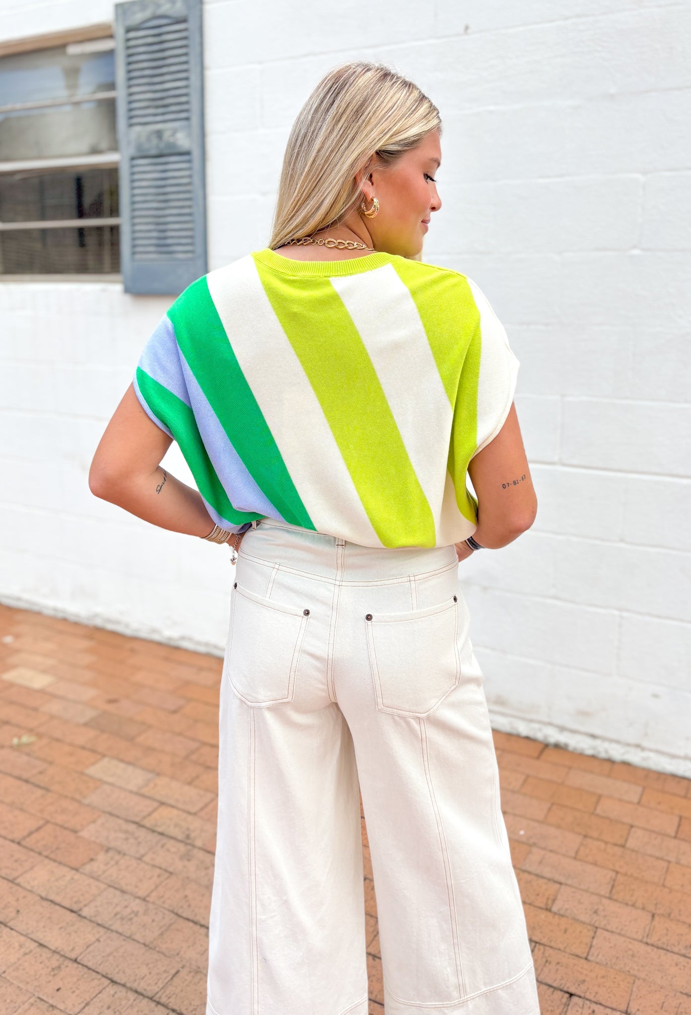 Never Told You Top, short sleeve sweater top with diagonal stripes in the color cream, lime green, kelly green, and light blue 