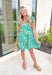 Out For Drinks Dress, ruffle sleeve tiered v-neck dress with an abstract pattern in the colors kelly green, amazon green, lime green, white, and pink