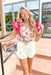 Sunny With A Chance Of Blooms Blouse, tulip printed ruffle sleeve blouse, hot pink ruffles on the sleeves, v-neck, tulips in aqua, hot pink, bubble gum pink, yellow, light pink, and cream