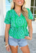Thinking Out Loud Top, kelly green puff sleeve blouse with v-neck, light blue eyelet lace detailing on the whole blouse
