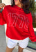 A timeless nod to American pride! This red pullover features “1776” in bold white lettering across the front, making it the perfect piece to celebrate Independence Day and beyond. Classic, patriotic, and easy to style, it’s a go-to for summer holidays, fireworks, and casual days. Made from soft 100% cotton, this pullover is comfortable and breathable while still giving you that cozy feel. 