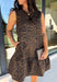 Leopard gets a refined update with this black and brown printed dress from Entro. The neutral color palette gives the statement print a classic feel, making it easy to wear for everything from dinner plans and work events to fall gatherings. A full button-down detail off centered adds an unexpected touch that sets this dress apart, while the sleeveless silhouette keeps the look clean and easy to layer. The tiered skirt adds movement and shape, and the fully lined design provides comfortable coverage.