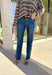 Sleek meets laid-back in these dark wash slim wide jeans from Vervet. The flattering high-rise fit and straight-but-wide leg shape make them an easy choice for pairing with everything from cozy sweaters to tailored blouses. The raw edge hem adds a touch of casual edge, perfect for dressing up or down. With a soft cotton blend and a hint of stretch, they’re comfortable enough for all-day wear while still holding their shape—your new go-to denim for the season.