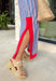 This chambray midi dress is made for all your 4th of July celebrations! From backyard BBQs and parades to fireworks under the stars, this dress is the perfect patriotic pick. The red and white stripe print pops against the chambray blue background, while the bold red contrast trim adds a fun, festive touch. Adjustable straps and a smocked back create a comfortable, flattering fit, and the side slits add easy movement for warm summer days. Fully lined and finished with side pockets.