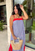 This chambray midi dress is made for all your 4th of July celebrations! From backyard BBQs and parades to fireworks under the stars, this dress is the perfect patriotic pick. The red and white stripe print pops against the chambray blue background, while the bold red contrast trim adds a fun, festive touch. Adjustable straps and a smocked back create a comfortable, flattering fit, and the side slits add easy movement for warm summer days. Fully lined and finished with side pockets.
