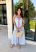 Classic stripes with a pop of color? Yes please! This blue and white striped sleeveless midi dress by Entro is the perfect spring-to-summer piece when you want something easy, flattering, and a little fun. The red contrast trim adds the cutest standout detail, and the v-cut neckline gives it a clean, modern touch that feels effortlessly polished. Just add sandals and sunnies for daytime, or dress it up with wedges and gold jewelry for an easy night-out look.