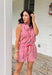 Meet your go-to romper for sunny days and festive celebrations. This red and white striped sleeveless romper is giving effortless summer charm with a playful, patriotic twist—perfect for the 4th of July and beyond. Designed with a collared neckline and front snap button detail, it has a polished feel while still keeping things relaxed and easy. The elastic waist with an adjustable tie creates a flattering, comfortable fit, and the chest pockets plus side pockets add that practical touch