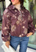 Make your fall layers a little more interesting with this deep burgundy jacket from Entro. A unique mix of stripes and neutral floral prints brings together rich autumn shades for a look that stands out while still being easy to style. The collared neckline and zipper-front closure give it a classic jacket feel, while the bubble hem adds shape and a fun, modern finish. Made from 100% cotton, it’s a great lightweight layer for those in-between fall days when you need just a little something extra. 