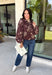 Make your fall layers a little more interesting with this deep burgundy jacket from Entro. A unique mix of stripes and neutral floral prints brings together rich autumn shades for a look that stands out while still being easy to style. The collared neckline and zipper-front closure give it a classic jacket feel, while the bubble hem adds shape and a fun, modern finish. Made from 100% cotton, it’s a great lightweight layer for those in-between fall days when you need just a little something extra. 