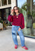 Classic stripes never go out of style, and this cozy knit top from Hyfve is the perfect addition to your fall wardrobe. Featuring bold red and navy stripes, this timeless top offers a relaxed silhouette that's easy to dress up or down. Ribbed detailing at the neckline, cuffs, and hem gives it a polished finish, while the soft fabric keeps you warm and comfortable all day long. 