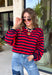 Classic stripes never go out of style, and this cozy knit top from Hyfve is the perfect addition to your fall wardrobe. Featuring bold red and navy stripes, this timeless top offers a relaxed silhouette that's easy to dress up or down. Ribbed detailing at the neckline, cuffs, and hem gives it a polished finish, while the soft fabric keeps you warm and comfortable all day long. 