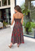 Celebrate the beauty of the season in this effortlessly feminine midi dress from Entro. Designed with a rich brown backdrop and a gorgeous floral print in warm fall-inspired shades, this timeless dress is perfect for any fall special occasion. The straight neckline and beautifully pleated bodice create an elegant, flattering silhouette, while the smocked back offers a comfortable, flexible fit. 