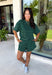 Easy, comfortable, and made for everyday wear, these hunter green striped shorts are a fall favorite you'll reach for again and again. Crafted from a soft knit fabric with an easy elastic waistband, they offer the perfect blend of comfort and style. The timeless white stripe print gives them a classic look, while the side pockets add everyday functionality. Pair them with the matching top for an effortlessly coordinated set