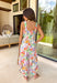 Say hello to your new one-and-done spring outfit! This white jumpsuit is covered in the prettiest colorful floral print with pops of green, orange, purple, pink, and yellow—basically sunshine in clothing form. The square neckline gives it a clean, flattering shape, while the smocked back keeps it comfy and flexible. Finished with side pockets (yes please), a side zipper for easy on-and-off, and adjustable ties at the waist and ankles, this piece is made for everything from weekend plans to vacation days.