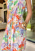 Say hello to your new one-and-done spring outfit! This white jumpsuit is covered in the prettiest colorful floral print with pops of green, orange, purple, pink, and yellow—basically sunshine in clothing form. The square neckline gives it a clean, flattering shape, while the smocked back keeps it comfy and flexible. Finished with side pockets (yes please), a side zipper for easy on-and-off, and adjustable ties at the waist and ankles, this piece is made for everything from weekend plans to vacation days.