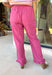 A playful pink palette gives these pants from Twentifourth plenty of personality while still keeping them easy to style. The subtle monochromatic polka dot print adds a fun touch of texture without overpowering the look, while the ruffle hem gives the relaxed silhouette a sweet finishing detail. An elastic waistband with a drawstring keeps them comfortable for all-day wear, and side and back pockets add everyday function. 