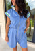 This light blue romper is the ultimate mix of sporty and effortless for summer! Made from a buttery soft fabric, it’s designed for all-day comfort while still looking put together. The white and green stripe trim along the neckline and sleeves gives it that fun athletic vibe, while the quarter zip and collared neckline add a polished touch. With an elastic waist and side pockets, it’s as functional as it is cute.